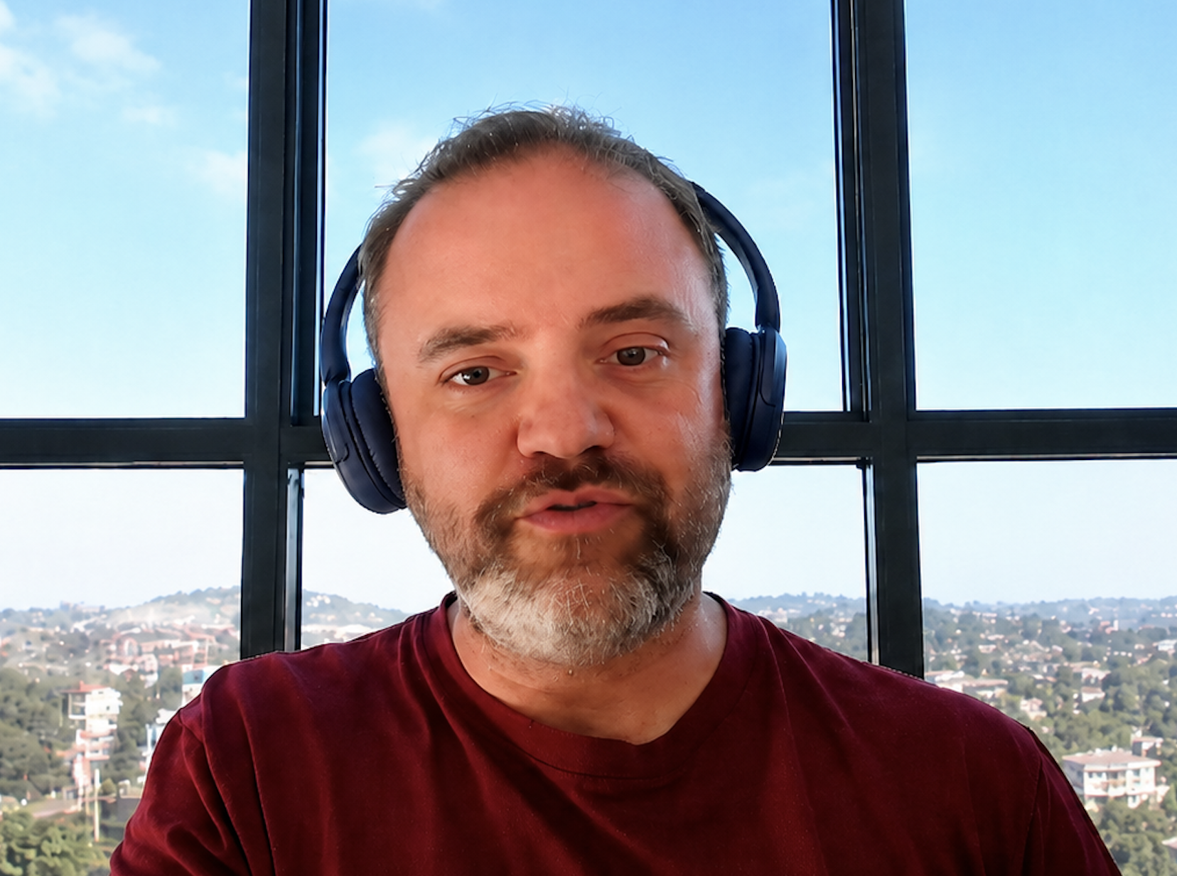 Matt Jope on a coaching call, wearing headphones