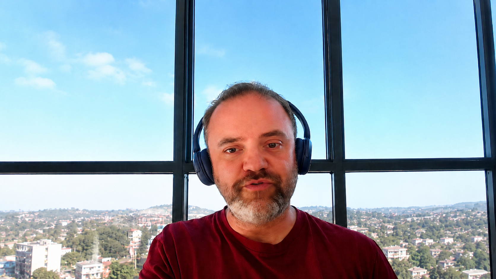 Matt Jope wearing headphones while leading an online coaching session